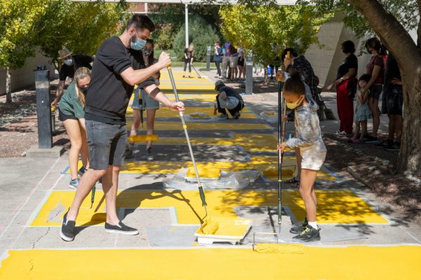 Painters working on mural