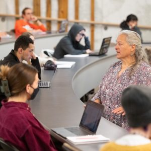 Doreen Martinez talking with CSU students in class