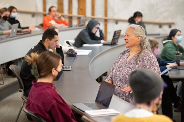 Doreen Martinez talking with CSU students in class